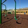 Swing set and playground with mountain views