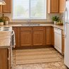 Kitchen with wood cabinetry, tile floor, and full-size appliances